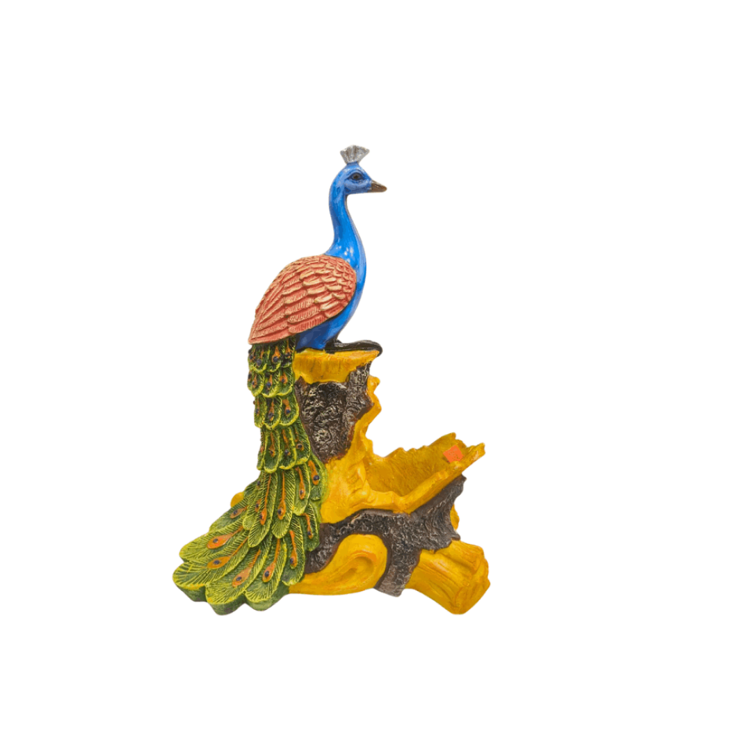 Colorful peacock Statue perched on a sculpted tree stump base