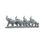 Grey Statue of four elephants walking in a line
